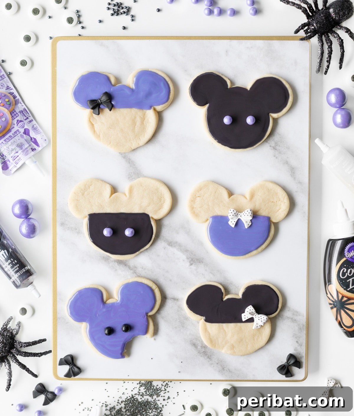 42 Spooktacular DIY Halloween Cookie Treats 10 Purple and black Mickey Mouse Halloween cookies