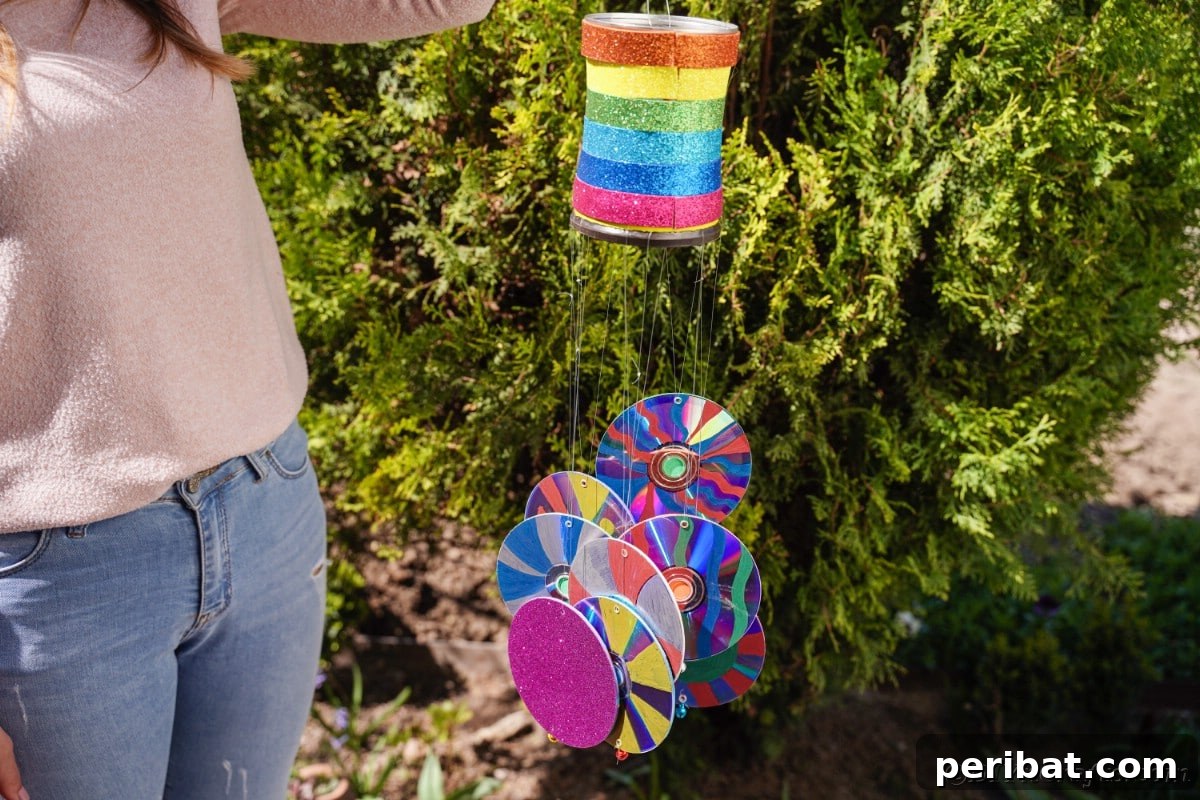 Simple DIY Ideas for Grown-Ups 50 Projects 5 woman in pink holding cd wind chime
