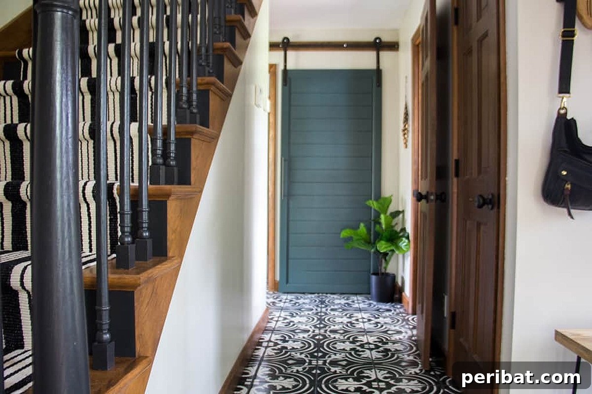 50 Smart DIY Home Improvement Hacks & Essential Products 12 Robust DIY barn door hardware installed on a wooden door, demonstrating a space-saving and stylish interior design choice