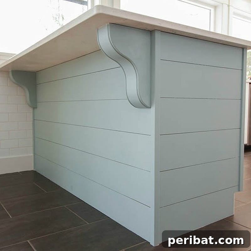 50 Smart DIY Home Improvement Hacks & Essential Products 26 Elegant DIY planked peninsula with decorative corbels, adding unique texture and charm to a kitchen island