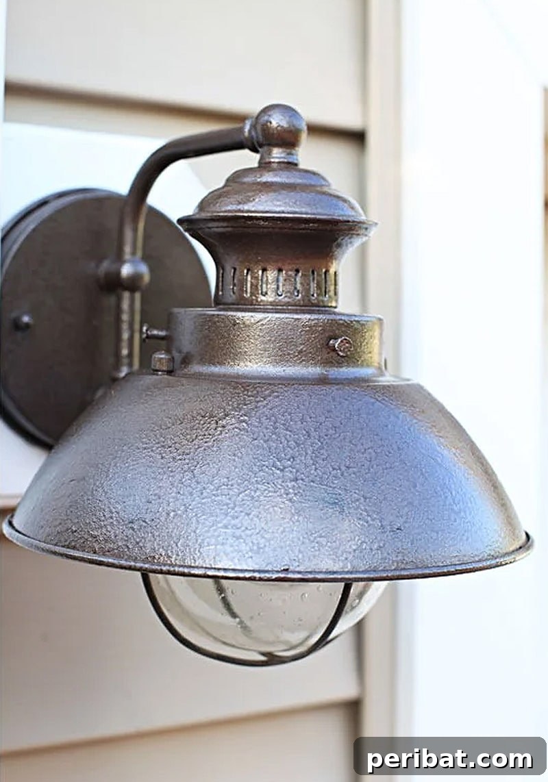 50 Smart DIY Home Improvement Hacks & Essential Products 27 Refurbished outdoor lighting fixtures with a hammered paint finish, showcasing a DIY transformation for enhanced curb appeal