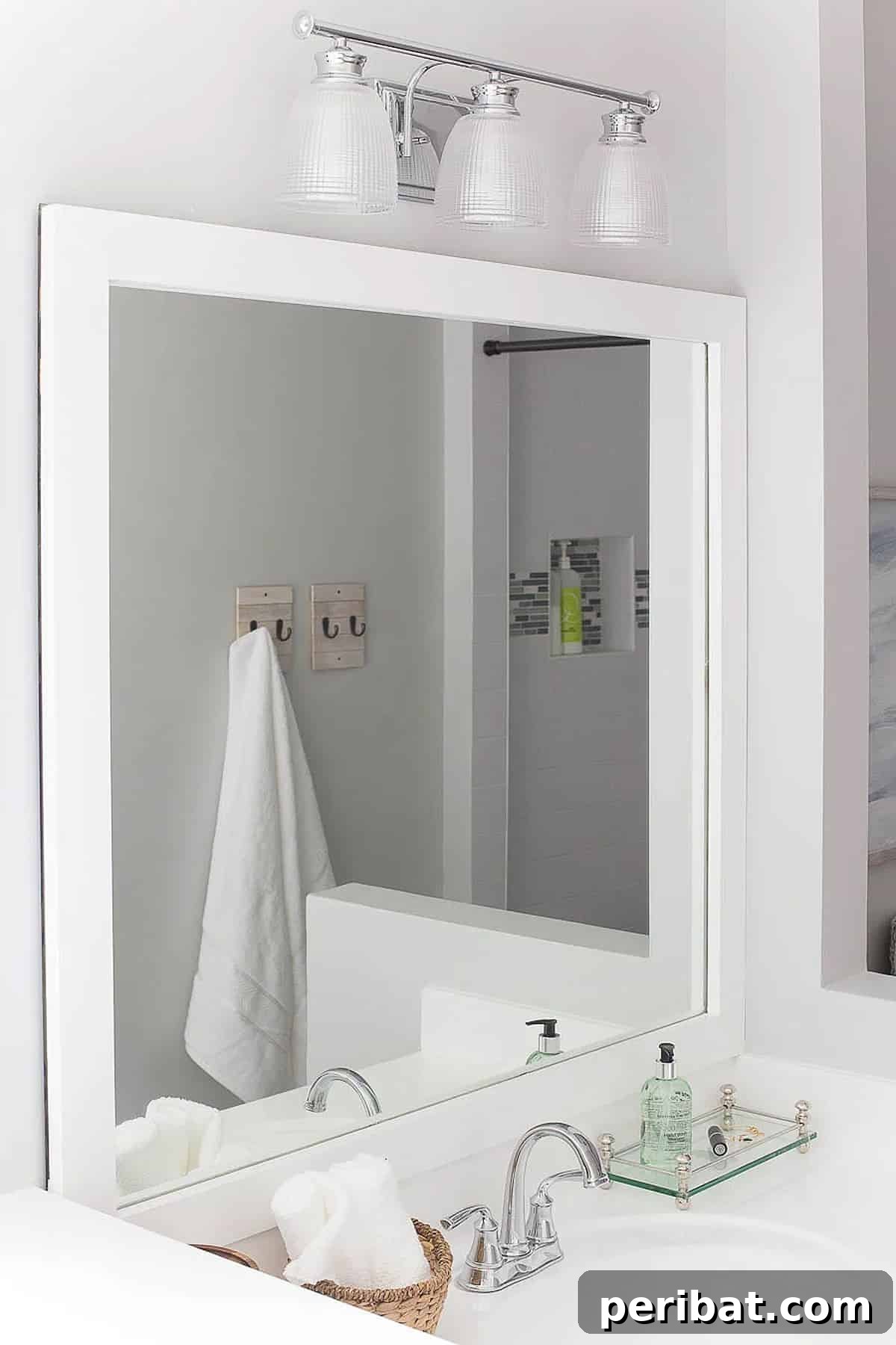50 Smart DIY Home Improvement Hacks & Essential Products 33 Stylish DIY bathroom mirror frame, transforming a plain mirror into a chic focal point for a refined bathroom interior