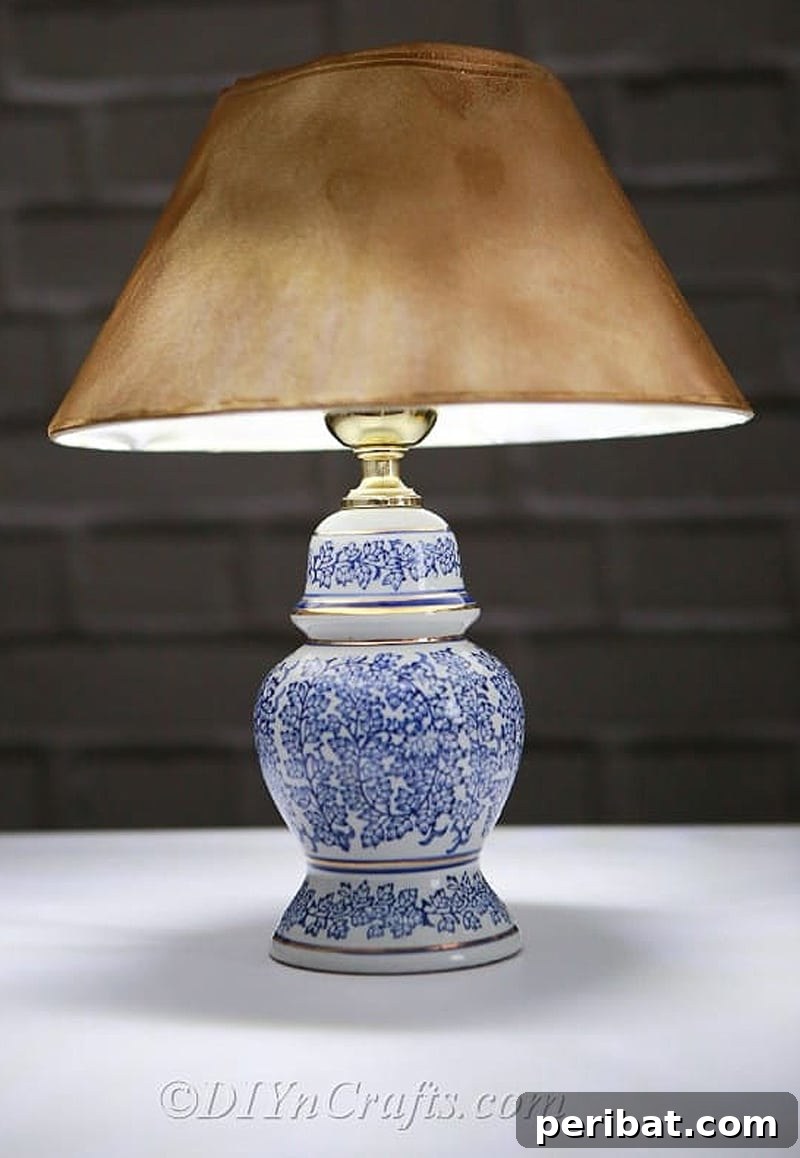 50 Smart DIY Home Improvement Hacks & Essential Products 7 Innovative DIY solar garden lamp created from an upcycled old table lamp, providing sustainable and charming outdoor illumination