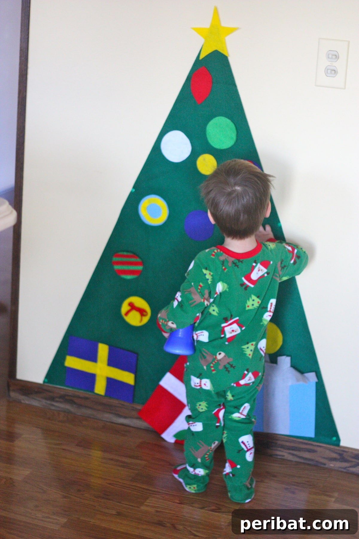 Beyond the Branch: 15 Unique Christmas Tree Ideas 18 Fun and Kid-Friendly Felt Christmas Tree with Detachable Ornaments