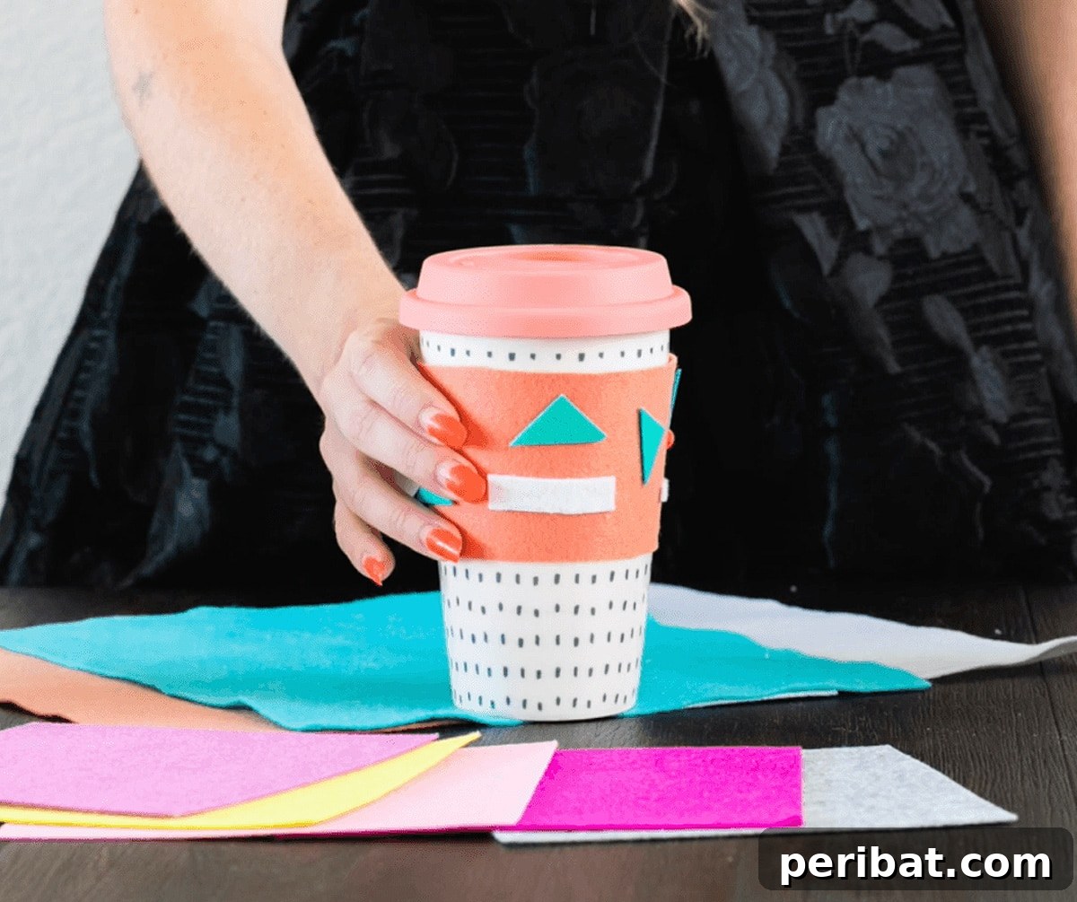 Creative coffee sleeve decorated with colorful washi tape designs, showcasing personalized artistry