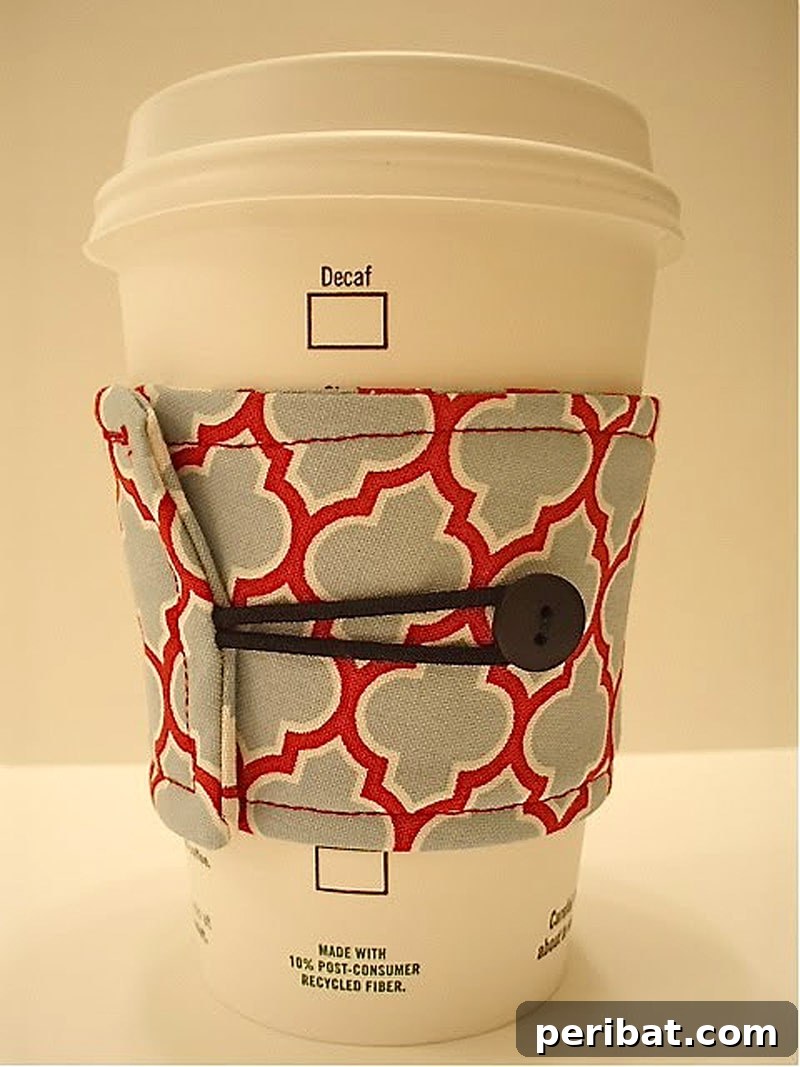Stylish reversible coffee sleeve, featuring two different fabrics for versatile use on any cup size