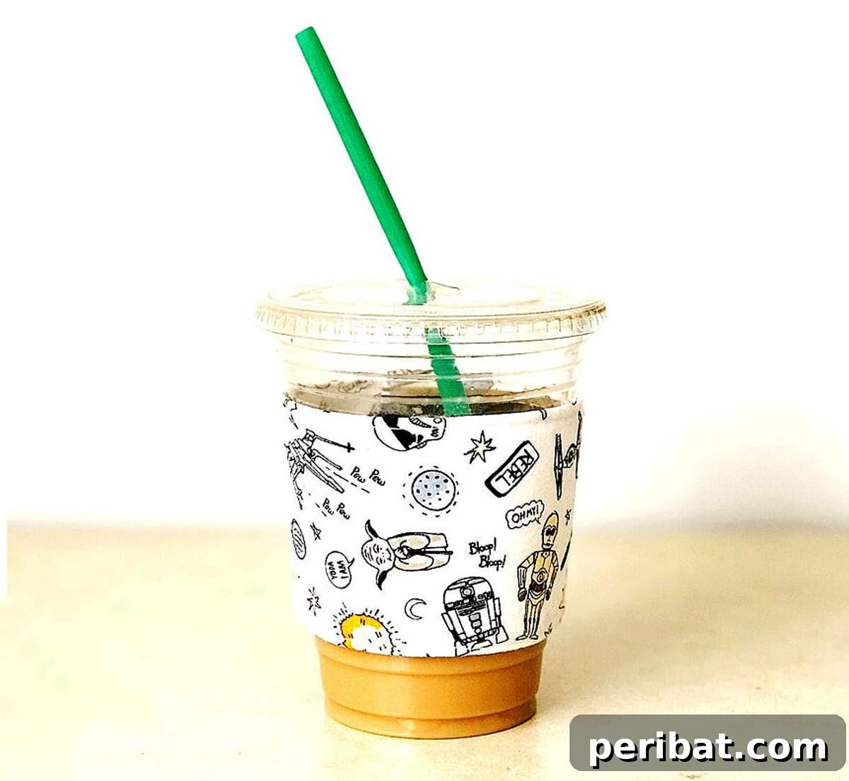 Handmade reusable coffee sleeve with an adjustable feature, showcasing sustainable crafting