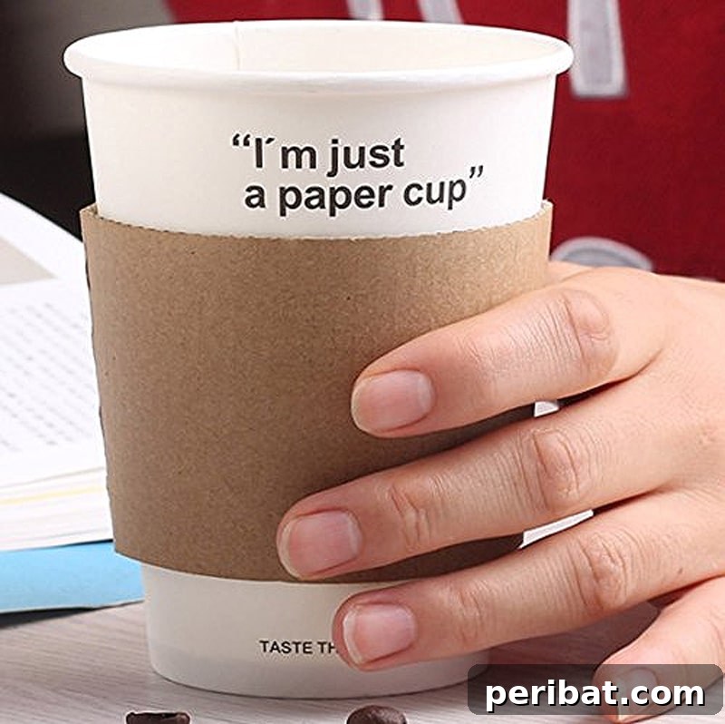 Stack of blank canvas coffee cup sleeves, perfect for customization for events like birthdays or Christmas