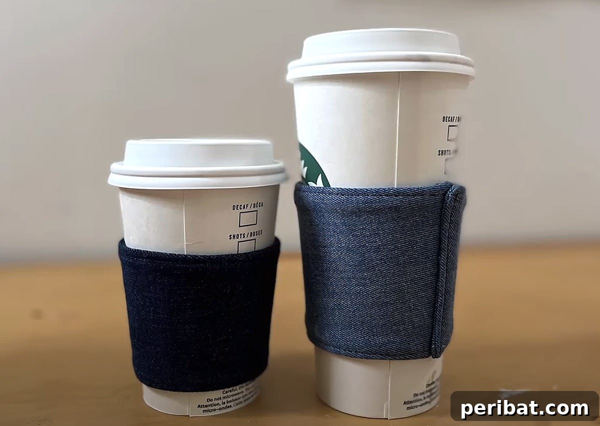 Stylish upcycled denim coffee sleeve made from old jeans, promoting sustainability and trendiness