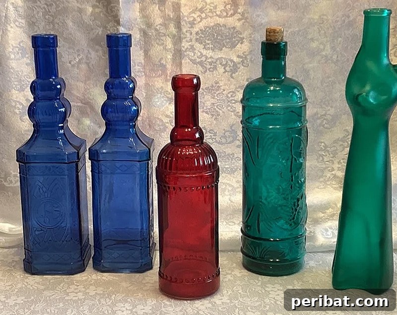 Uncork Your Creativity: 50 Wine Bottle and Glass DIY Projects 41 decorative colourful different shapes sizes colours reusable wine bottles