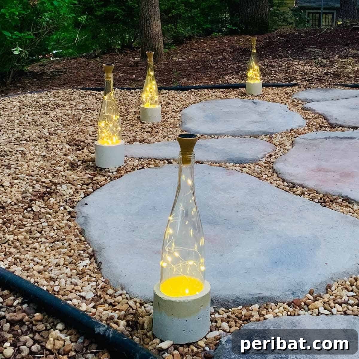 Uncork Your Creativity: 50 Wine Bottle and Glass DIY Projects 51 wine bottle lights with pretty cement bases