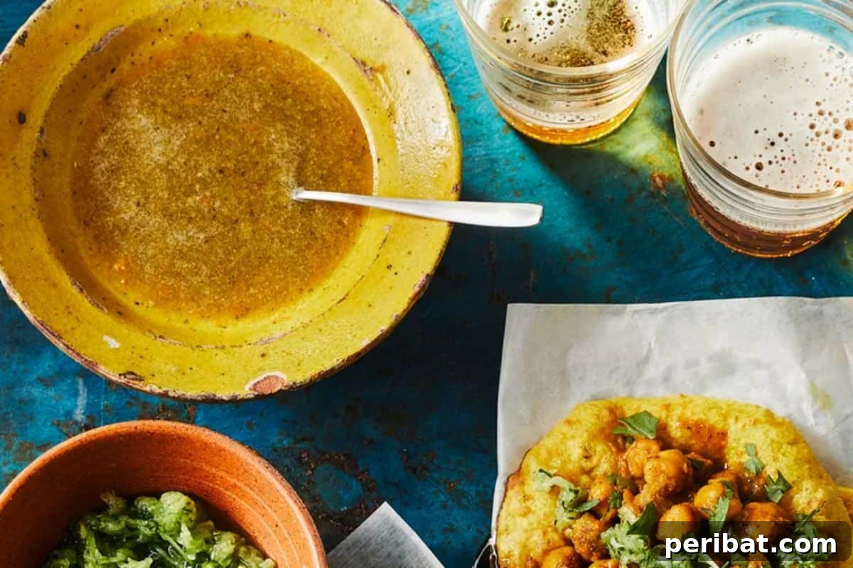 Craft Your Own Heat 26 DIY Hot Sauce Kits and Recipes 21 Scotch Bonnet Pepper Sauce served elegantly on a plate with herbs.