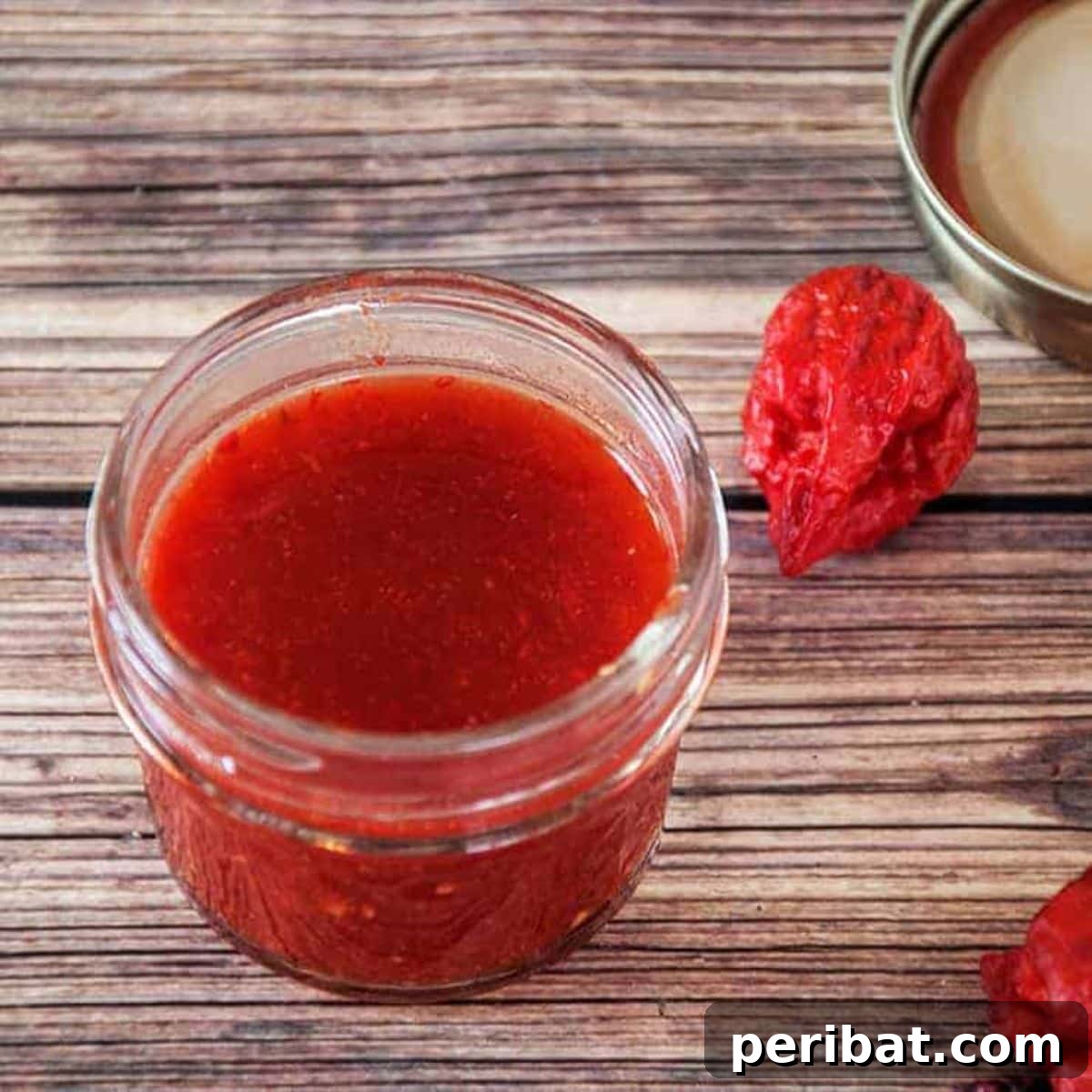 Craft Your Own Heat 26 DIY Hot Sauce Kits and Recipes 4 A single bottle of intensely hot DIY Carolina Reaper hot sauce, appealing to extreme spice lovers.
