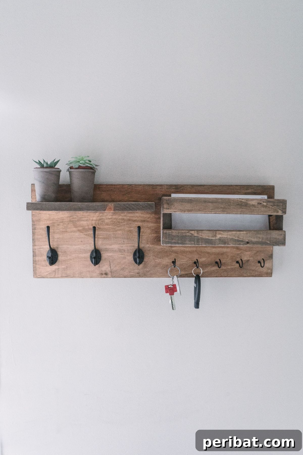 Transform Your Entryway: 32 Genius DIY Organizing Ideas 15 Rustic DIY entryway organizer made from reclaimed wood scraps.