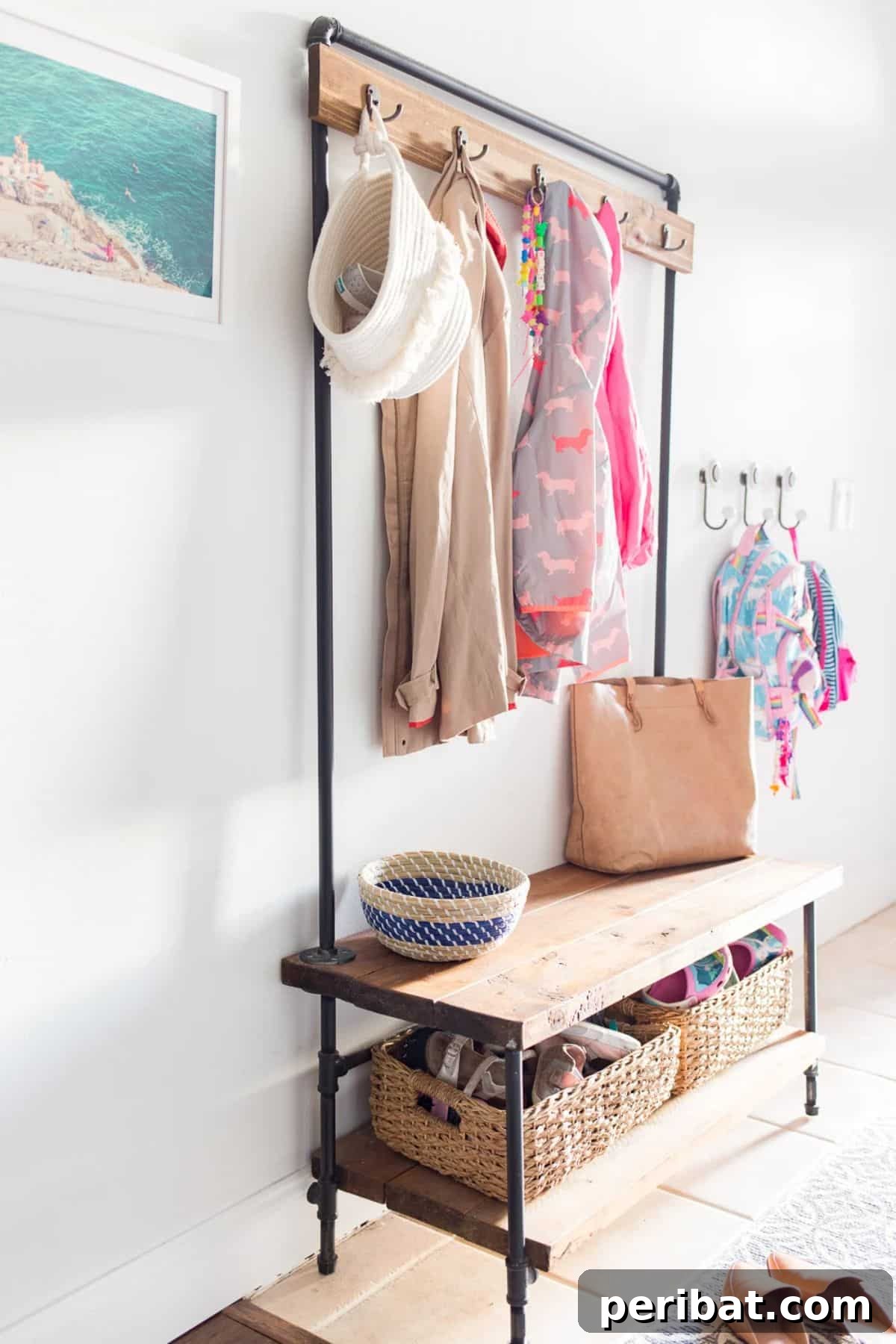 Transform Your Entryway: 32 Genius DIY Organizing Ideas 18 Entryway organizer made from wood shelves and industrial pipes.
