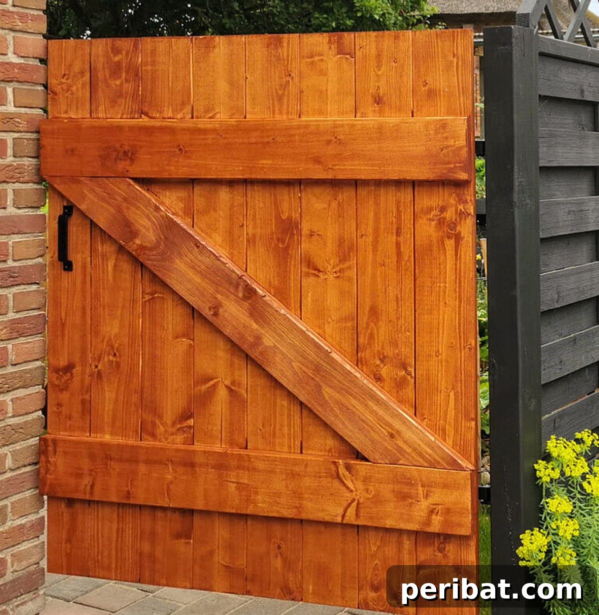 20 Creative DIY Garden Gate Designs 11 A robust wooden DIY garden gate, inspired by Sari's Garage instructions.