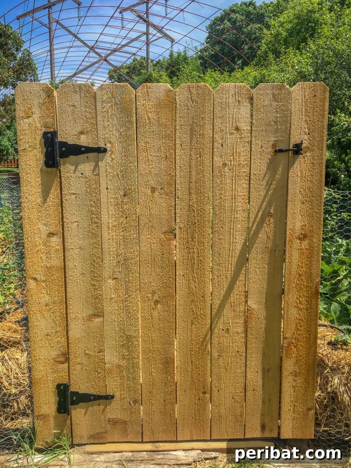 20 Creative DIY Garden Gate Designs 19 Elegant DIY cedar garden gate showcasing natural beauty and sleek design.
