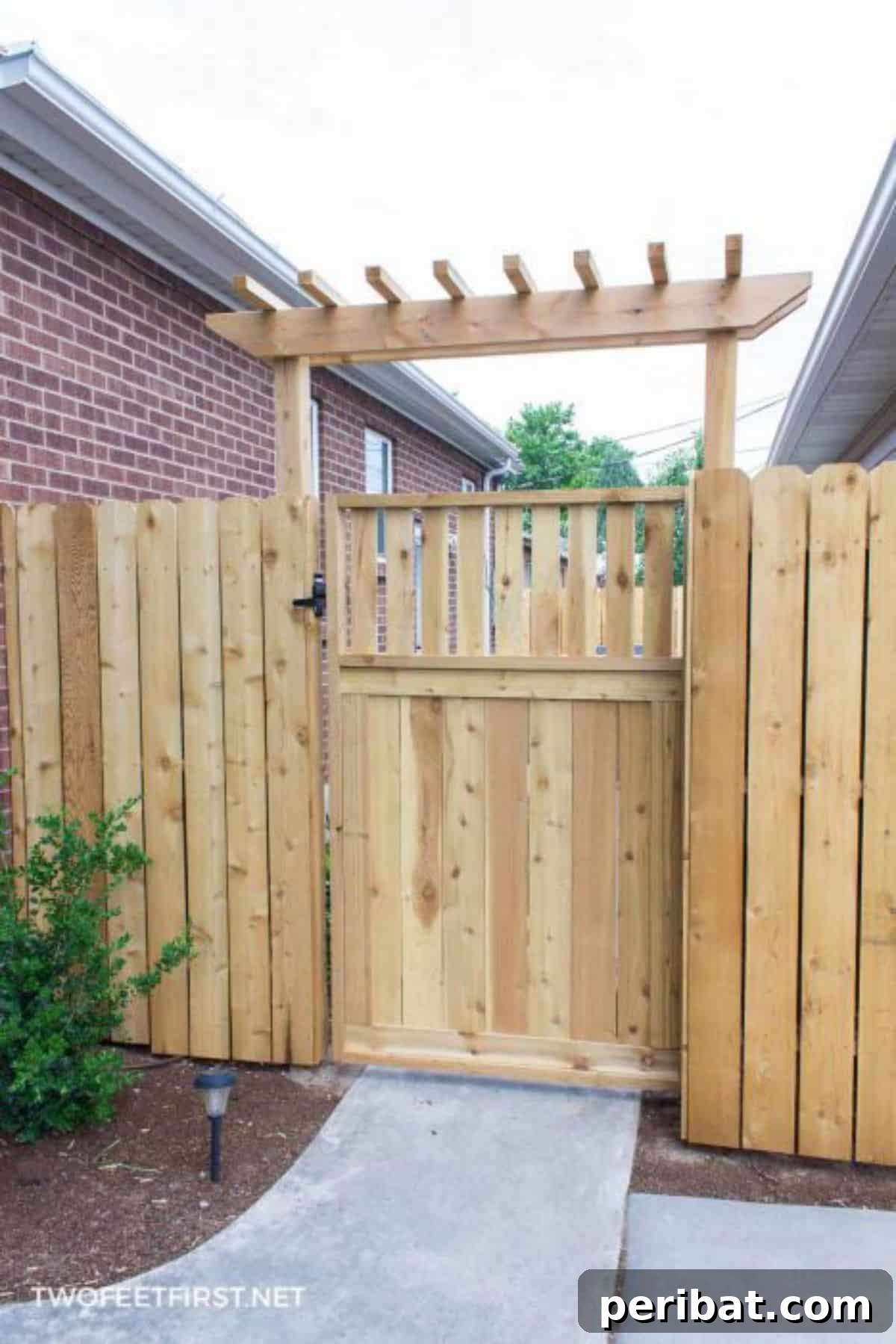 20 Creative DIY Garden Gate Designs 7 Rustic DIY wooden garden gate with a charming, natural appeal.