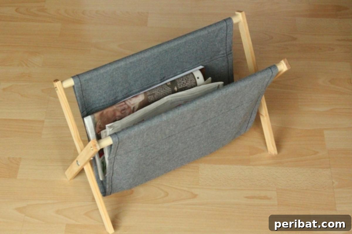 Cozy DIY Rustic Magazine Folding Rack made from wood and denim