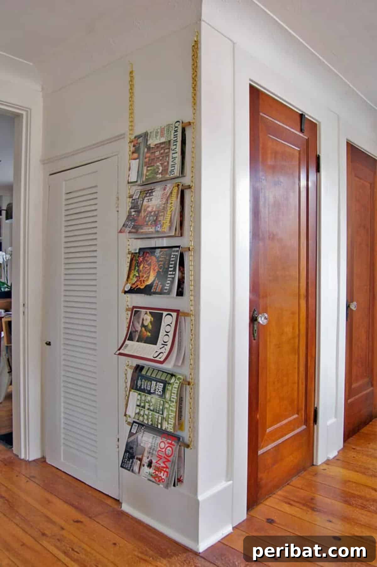 Unique DIY Wall Magazine Rack using chains and dowels