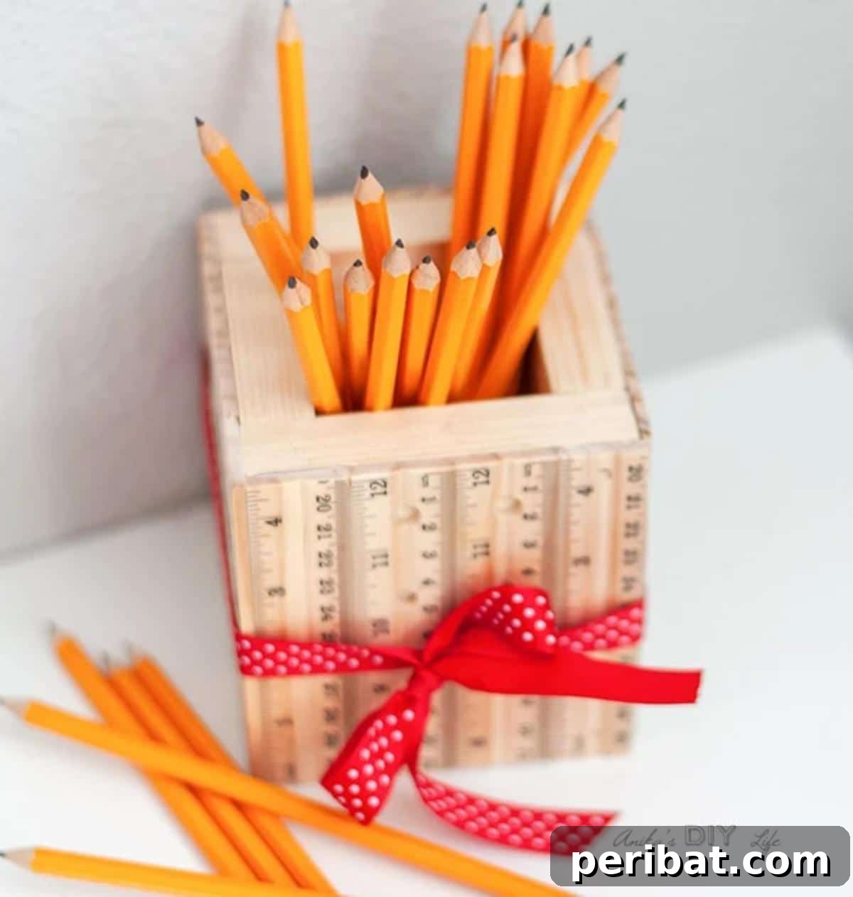 DIY Ruler Pencil Holder, an easy and charming craft made from scrap wood and rulers, perfect for students or teachers.