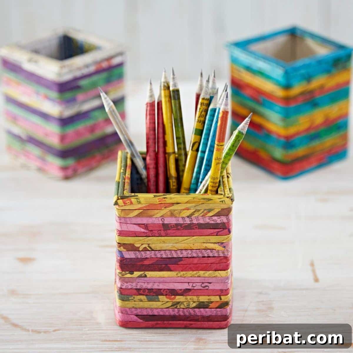Recycled Newspaper Pencil Holder, a unique square organizer promoting eco-friendly crafting from upcycled materials.