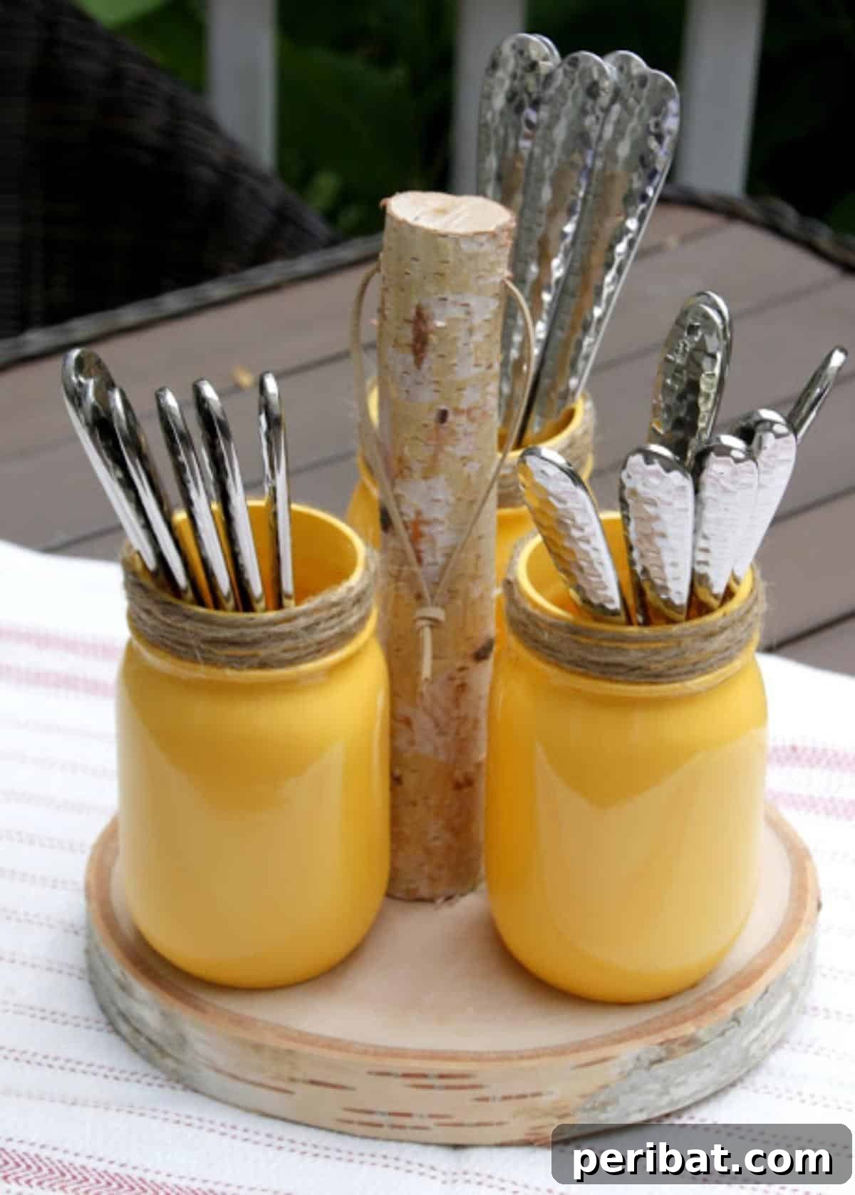 DIY Mason Jar Utensil Holder, a captivating rustic organizer made with birch slices and branches, perfect for home or office.