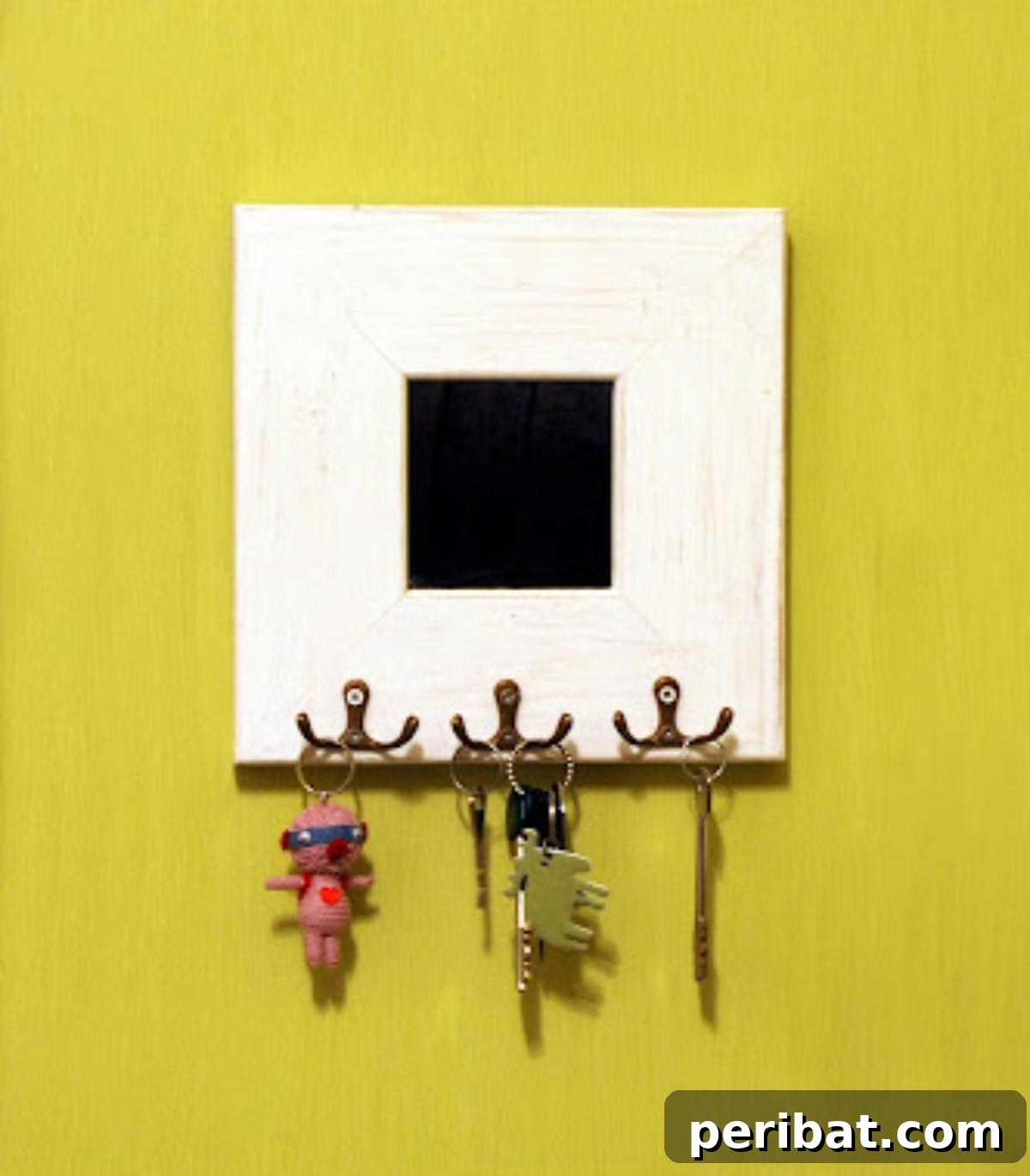 47 Clever DIY Key Holder and Organizer Projects 27 DIY Key Holder Mirror