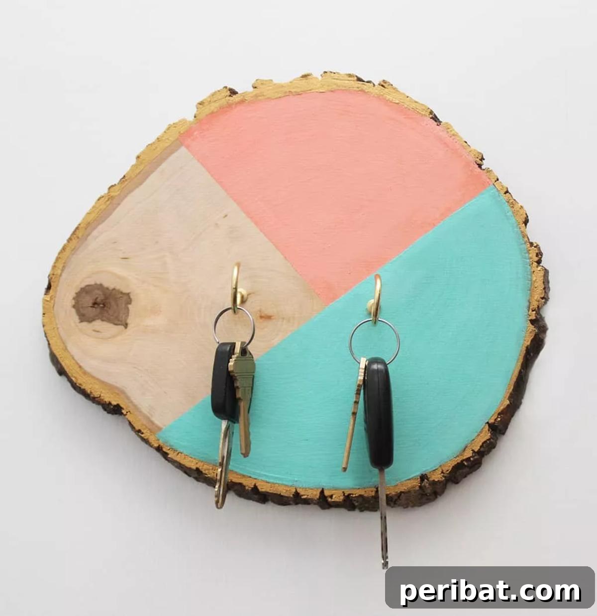 47 Clever DIY Key Holder and Organizer Projects 33 DIY Key Holder Color Block Wood Slice