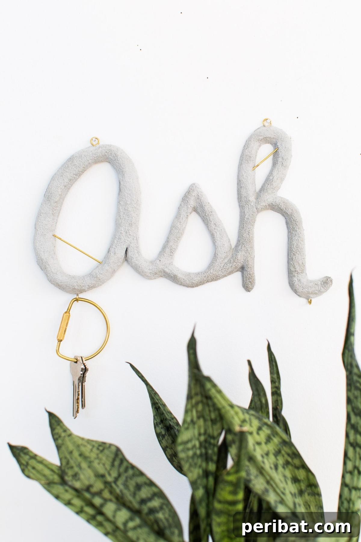 47 Clever DIY Key Holder and Organizer Projects 10 Hanging Concrete Monogram DIY Key Holder