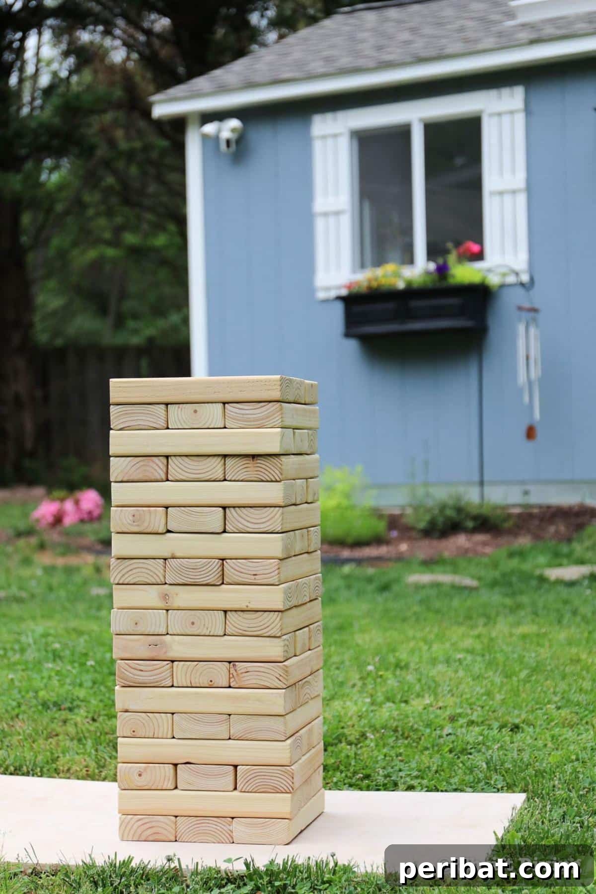 Create Your Own Giant Jenga: 20 DIY Blocks, Plans, and Exciting Game Ideas 13 A creative DIY Giant Jenga 'Truth or Dare' game, featuring blocks with attached envelopes for interactive play suitable for all ages.