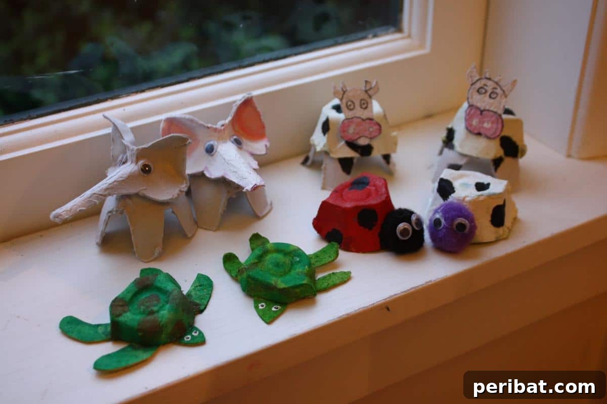 35 Mind-Blowing Creations from Empty Egg Cartons 6 A collection of adorable small animal figures, including elephants, pigs, and turtles, all cleverly crafted from painted egg cartons.