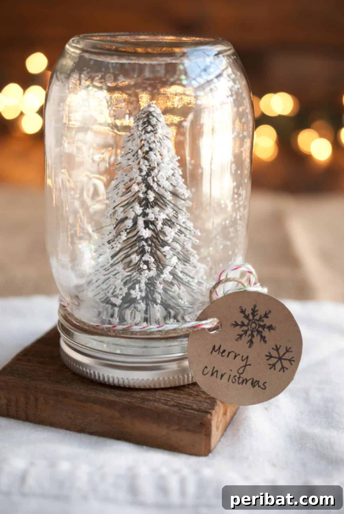 Craft Your Own Winter Wonderland: Snow Globe Projects & Kits 23 DIY Anthropologie Mason Jar Snow Globe