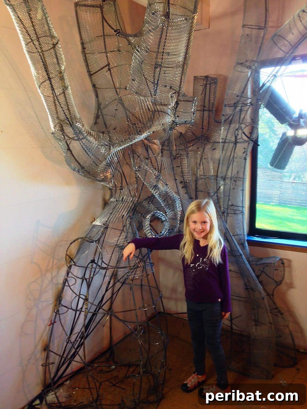Dad Builds a Magical Indoor Tree, Turning Daughter's Bedroom Into a Dreamland 22 Happy daughter inspecting the partially completed tree structure