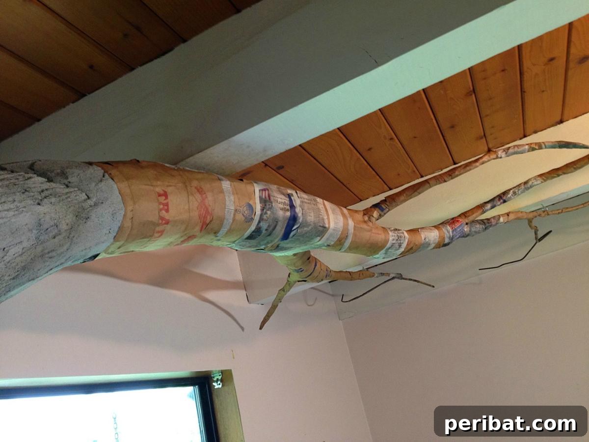 Dad Builds a Magical Indoor Tree, Turning Daughter's Bedroom Into a Dreamland 25 Papier-mâché application for outer, thinner branches of the tree