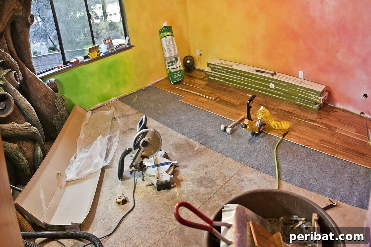 Dad Builds a Magical Indoor Tree, Turning Daughter's Bedroom Into a Dreamland 35 Installing hardwood floors with father-in-law's help