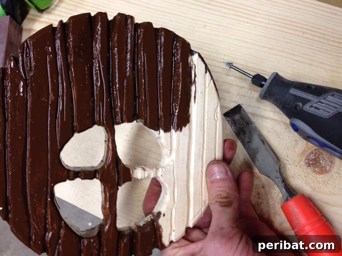 Dad Builds a Magical Indoor Tree, Turning Daughter's Bedroom Into a Dreamland 43 Dremel tool used to carve wood details, followed by wood stain