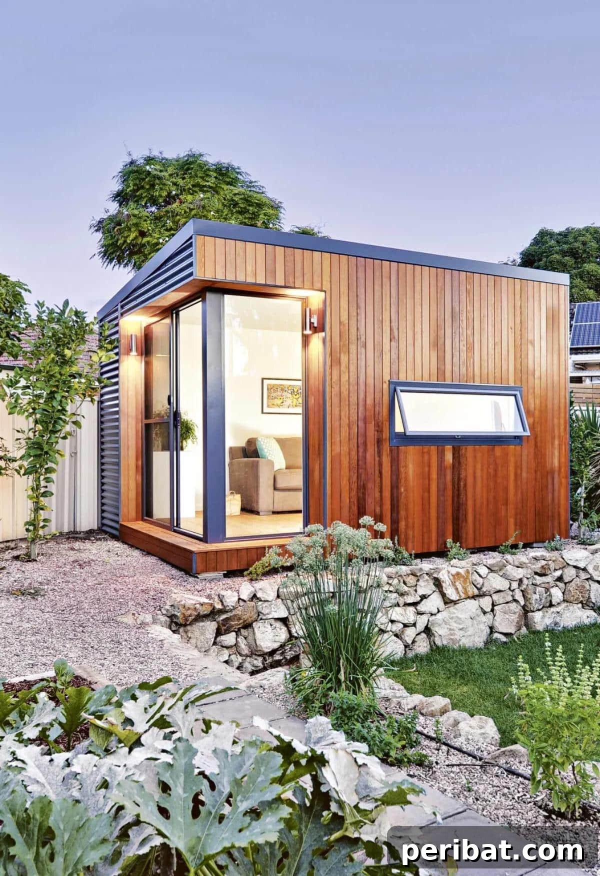 Unlock Your Potential: 42 Inspiring Backyard Studio Shed Designs 14 A sophisticated designer backyard room, showcasing modern architecture, expansive glass, and a seamless blend with the garden.
