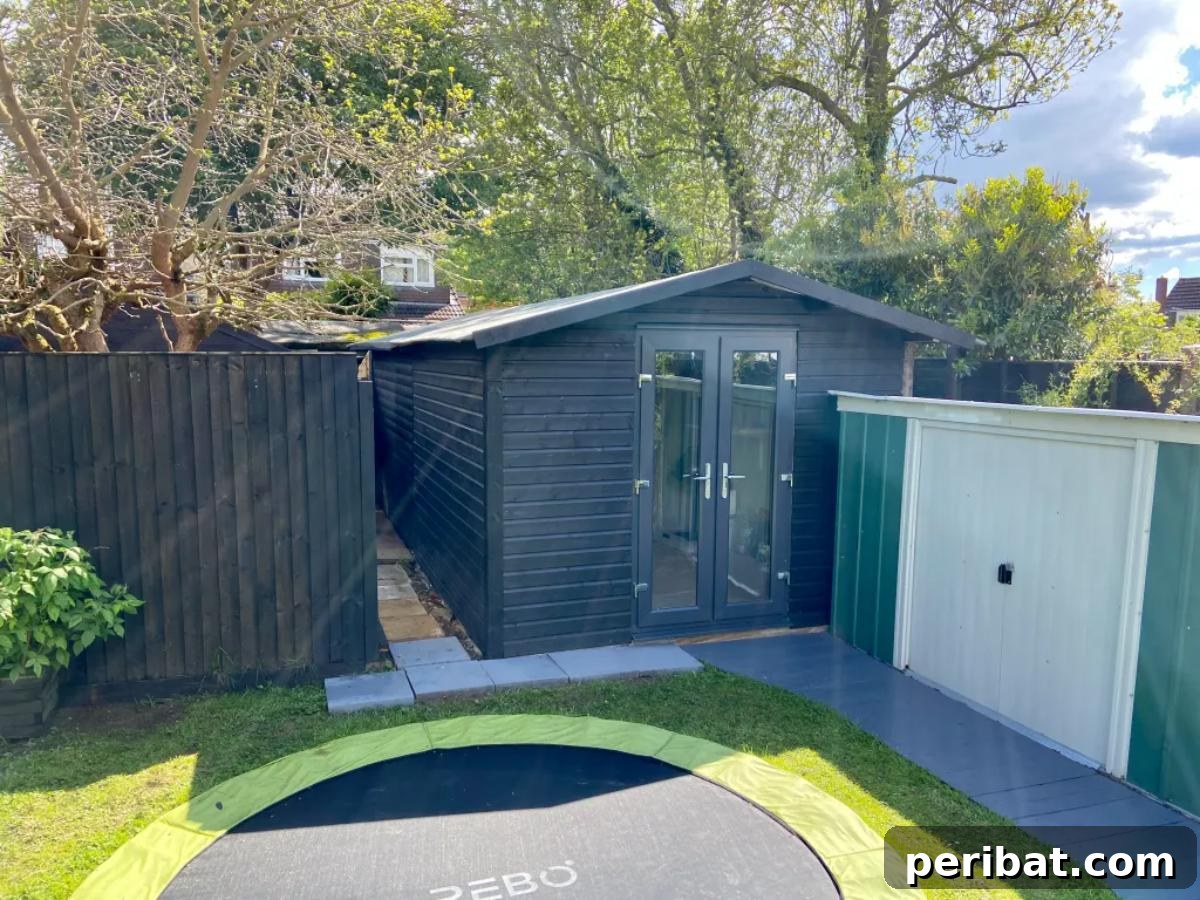 Unlock Your Potential: 42 Inspiring Backyard Studio Shed Designs 22 A budget-friendly DIY garden office built from scratch, showcasing resourceful construction and a cozy interior.