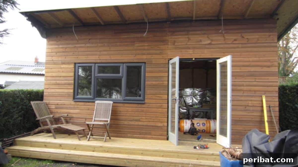 Unlock Your Potential: 42 Inspiring Backyard Studio Shed Designs 34 A well-insulated DIY garden office, designed for year-round comfort and productivity in any climate.