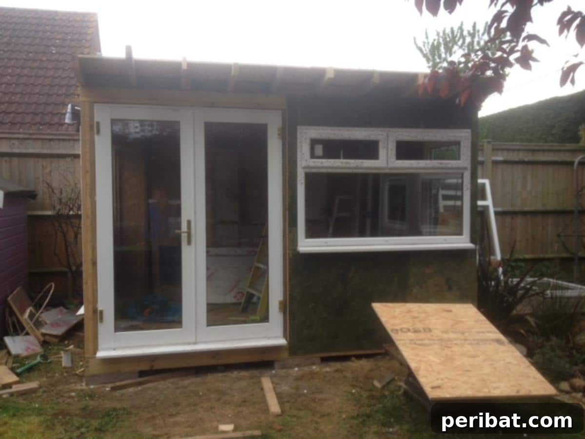 Unlock Your Potential: 42 Inspiring Backyard Studio Shed Designs 39 A cost-effective DIY Garden Office, demonstrating how to build a functional workspace with minimal expenditure.