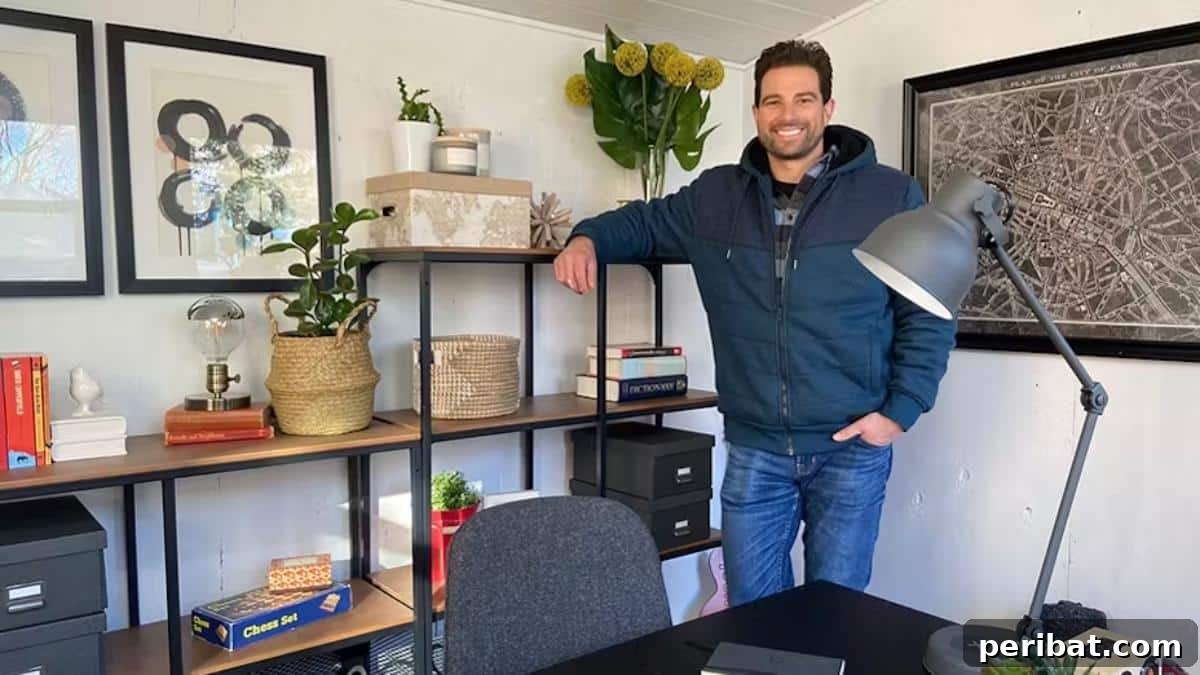 Unlock Your Potential: 42 Inspiring Backyard Studio Shed Designs 6 The interior of a functional and well-lit backyard office shed, featuring a desk, comfortable chair, and shelving.