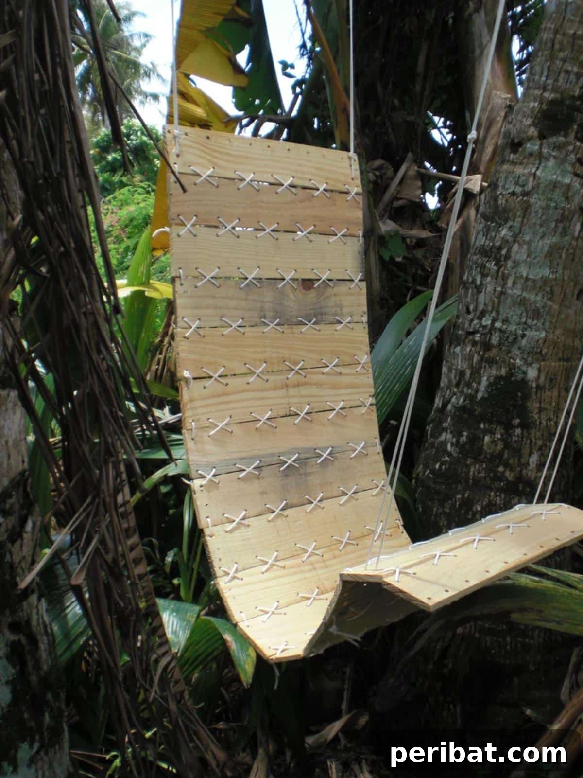 Craft Your Perfect Patio: 27 DIY Chair Designs for Cozy Outdoor Living 24 DIY Paracord Laced-Pallet Hanging Chair