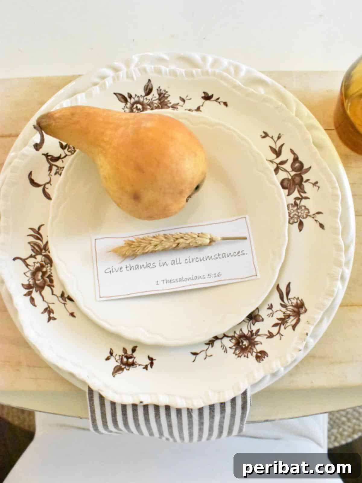 Simple and Unique Fall Place Card. Displays place cards featuring autumn elements like small gourds, pinecones, or leaves, with names written on them, ideal for fall-themed gatherings.