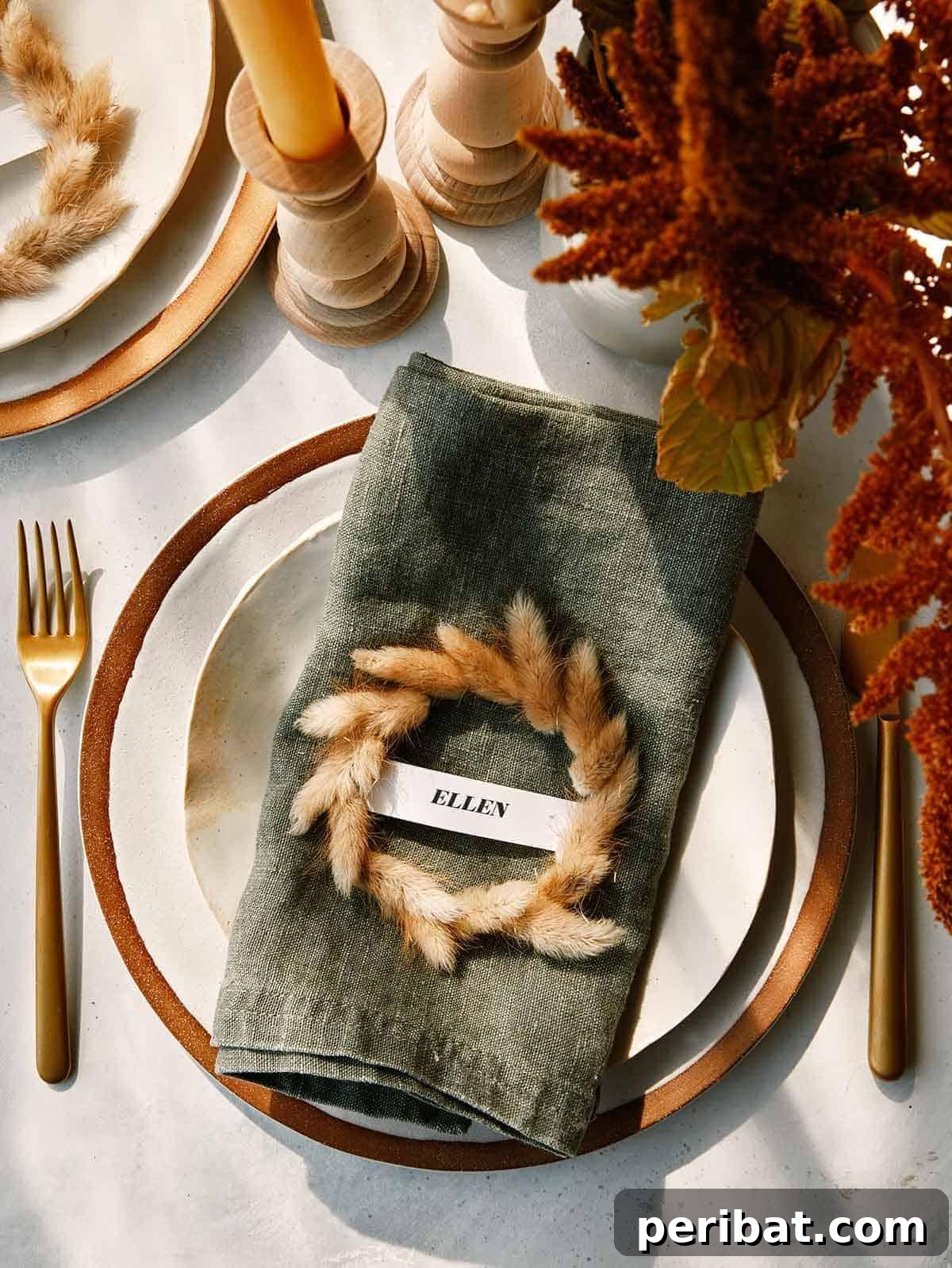 Mini Wreath Place Card. Shows small, delicate wreaths with a name tag attached, bringing a botanical and festive feel to event table settings.