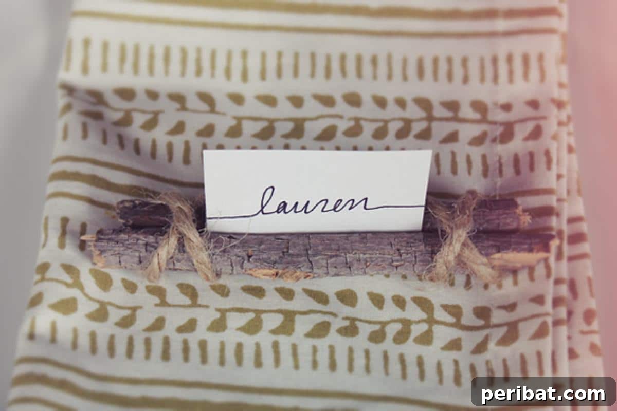 DIY Twig and Twine Place Card. Displays place cards made with small natural twigs and twine, showcasing a simple yet visually appealing organic design.
