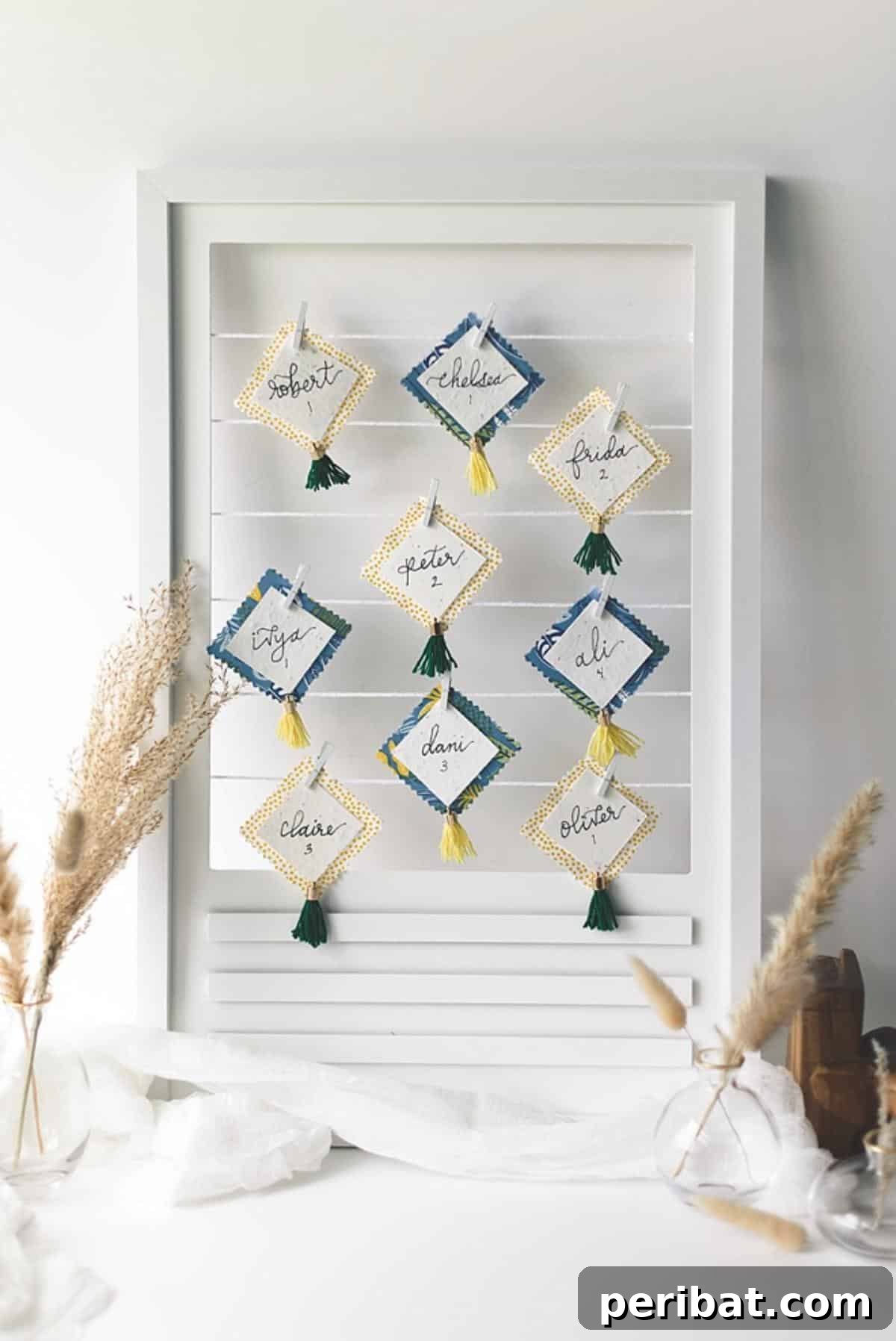 Anthropologie-Inspired Fabric Wedding Place Cards. Displays place cards made from fabric swatches with bohemian patterns and textures, channeling a unique, free-spirited aesthetic for weddings.