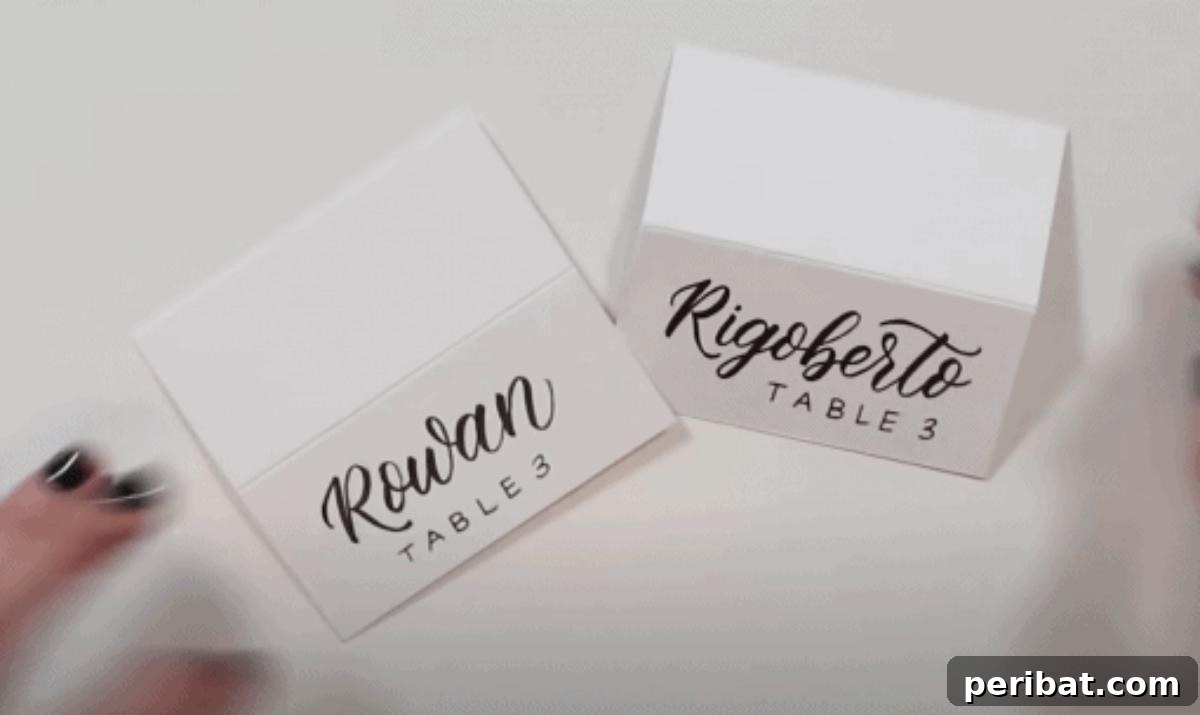 DIY Calligraphy Wedding Place Cards. Features beautifully hand-lettered place cards, showcasing the classic and elegant art of calligraphy for wedding events.