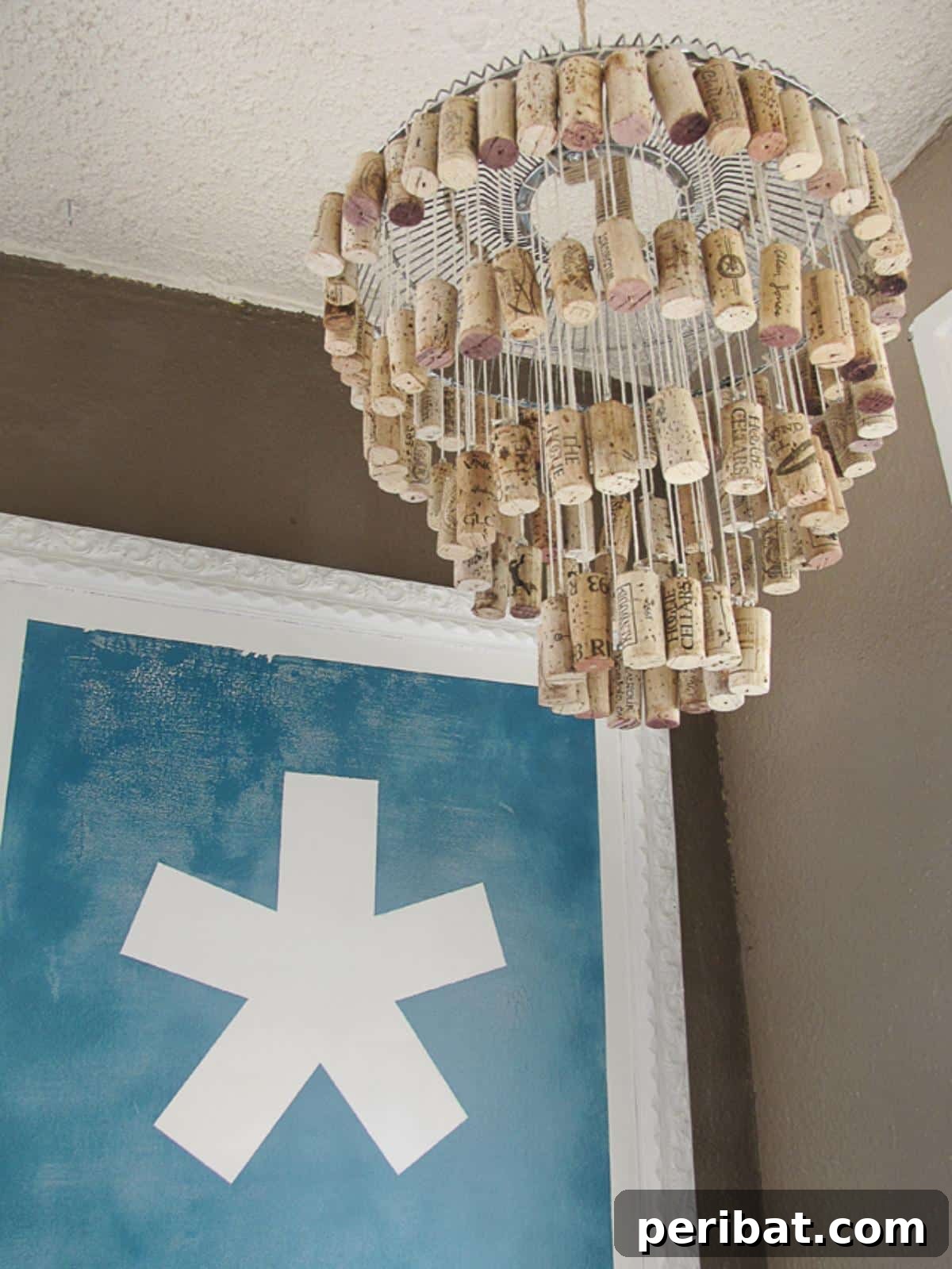 Uncork Your Creativity 50 Wine Cork DIY Projects 27 A DIY wine cork chandelier, an elaborate light fixture made from numerous wine corks suspended or arranged to form a unique and rustic chandelier.