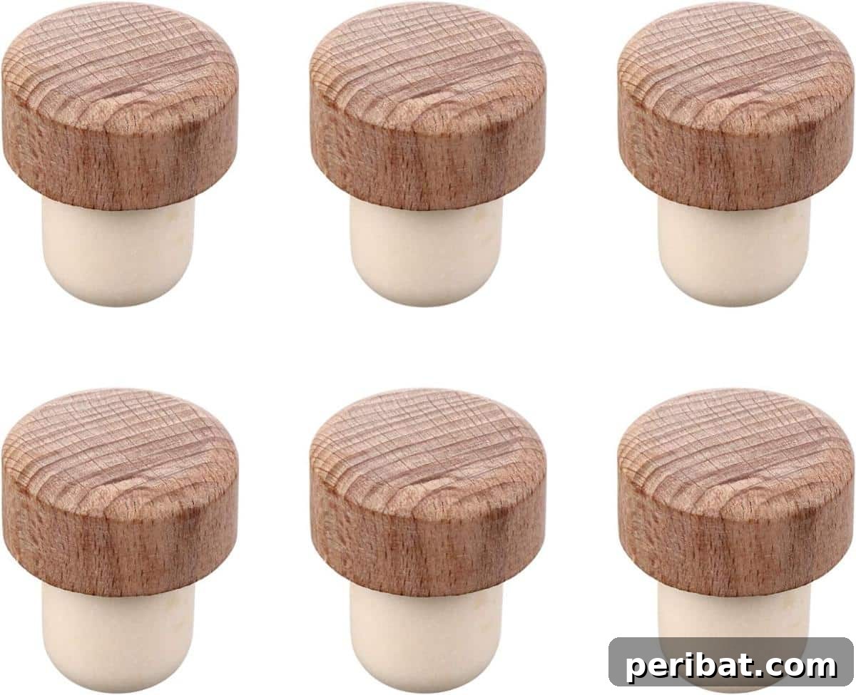 Uncork Your Creativity 50 Wine Cork DIY Projects 50 A wooden wine bottle stopper, designed with a sturdy wooden top and a cork base, perfect for sealing wine bottles securely.